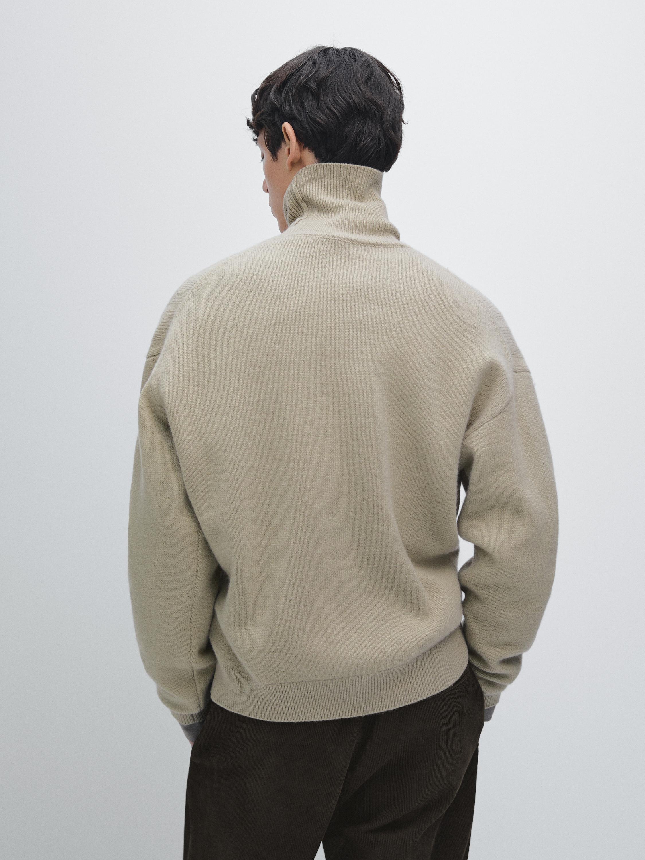 Wool blend knit sweater with high neck